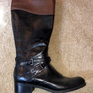 Black and brown knee high boots